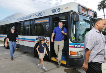 passengers getting off bus